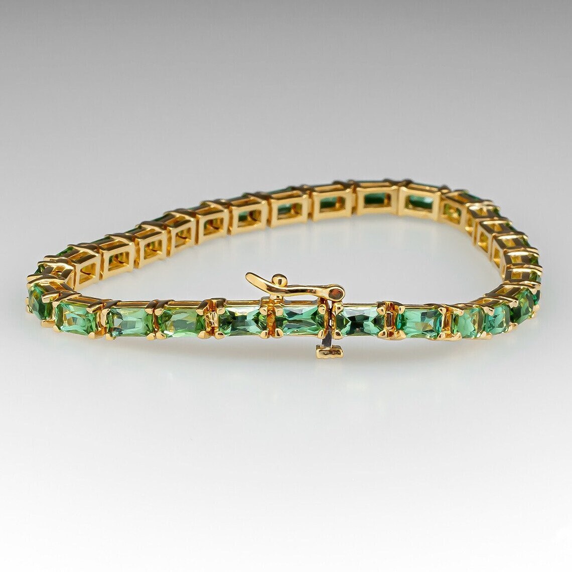 Baguette Emerald Tennis Bracelet: 925 Sterling Silver Prong Set